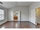 Large bedroom with wood flooring, vaulted ceiling, and ensuite bathroom at 657 Kenridge Dr, Suwanee, GA 30024