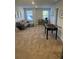 Spacious bonus room with a foosball table, comfortable seating, and ample natural light at 740 Great Oak Pl, Villa Rica, GA 30180