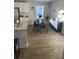 Open dining area adjacent to the kitchen with stylish decor and natural light at 740 Great Oak Pl, Villa Rica, GA 30180
