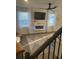 Cozy living room with a modern fireplace, TV, and stylish decor, perfect for relaxation at 740 Great Oak Pl, Villa Rica, GA 30180