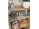 Close-up of a stylish shelf featuring decor, frames, and decorative items at 740 Great Oak Pl, Villa Rica, GA 30180