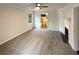Large open bedroom with a decorative fireplace, and access to a private bathroom at 121 Northwoods Rd, Sharpsburg, GA 30277