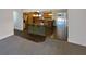 Well-appointed kitchen featuring wooden cabinets, granite countertops and a center island at 121 Northwoods Rd, Sharpsburg, GA 30277
