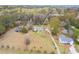 Aerial view of home, showcasing its location in a lush neighborhood at 1312 Milstead Ave, Conyers, GA 30012
