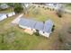 This property features a freshly built wooden deck, mature trees, and a well-kept lawn at 1312 Milstead Ave, Conyers, GA 30012