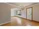Bright dining room with access to the living room and the back door at 1312 Milstead Ave, Conyers, GA 30012