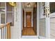 Inviting entryway with gleaming hardwood floors and natural light at 1312 Milstead Ave, Conyers, GA 30012