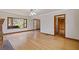 Open living area with hardwood floors and plenty of natural light at 1312 Milstead Ave, Conyers, GA 30012