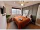 Charming bedroom featuring a cozy bed, large window with city views, and stylish decor at 215 Piedmont Ne Ave # 2205, Atlanta, GA 30308