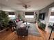 Inviting living room with wood floors, a ceiling fan, and comfortable seating for a relaxing atmosphere at 215 Piedmont Ne Ave # 2205, Atlanta, GA 30308