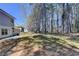 Lawn and tree area to the home provide space at 4654 Webster Way, Acworth, GA 30101