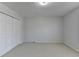 Bedroom with neutral walls and carpeting and a closet with sliding doors at 4654 Webster Way, Acworth, GA 30101