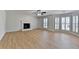 Spacious living room with a fireplace and large windows providing natural light at 4654 Webster Way, Acworth, GA 30101