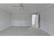 A large main bedroom with neutral colors and carpet flooring at 4654 Webster Way, Acworth, GA 30101