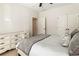 Bright bedroom featuring a neutral color scheme, plush bedding, and natural light from large windows at 625 Aunt Lucy Sw Ln # 29, Smyrna, GA 30082