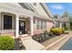 Inviting front porch with brick accents and decorative wreath, creating a warm welcome at 625 Aunt Lucy Sw Ln # 29, Smyrna, GA 30082