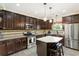 Stylish kitchen with stainless appliances, granite counters, and ample cabinet space at 625 Aunt Lucy Sw Ln # 29, Smyrna, GA 30082