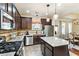 Modern kitchen with stainless steel appliances, granite countertops, and central island at 625 Aunt Lucy Sw Ln # 29, Smyrna, GA 30082