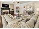 Inviting living room with fireplace, hardwood floors, and a view into the kitchen, perfect for gatherings at 625 Aunt Lucy Sw Ln # 29, Smyrna, GA 30082