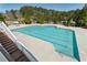 Community pool area with a clean, refreshing pool surrounded by a spacious deck at 625 Aunt Lucy Sw Ln # 29, Smyrna, GA 30082