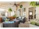 Cozy sunroom with wicker furniture, potted plants, and plenty of natural light at 625 Aunt Lucy Sw Ln # 29, Smyrna, GA 30082
