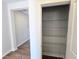 Walk-in closet with shelves for efficient storage at 2714 Mourning Dove Drive (Lot 33), Grayson, GA 30017