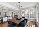 Open dining area with hardwood floors, modern lighting and views to living spaces at 415 Fayetteville Rd, Decatur, GA 30030