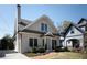 Charming brick home featuring a classic design, manicured landscaping and inviting curb appeal at 415 Fayetteville Rd, Decatur, GA 30030