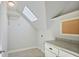 Cozy laundry room with skylight, countertop, and available hook-ups for washer and dryer at 415 Fayetteville Rd, Decatur, GA 30030