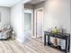 Inviting hallway with gray walls and decorative table at 1238 Westboro Sw Dr, Atlanta, GA 30310