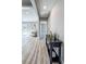 Inviting hallway with wood-look floors, connecting the living spaces in a neutral color palette at 1238 Westboro Sw Dr, Atlanta, GA 30310