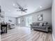 Bright living room with recessed lighting, modern ceiling fan, and stylish flooring, creating an inviting atmosphere at 1238 Westboro Sw Dr, Atlanta, GA 30310