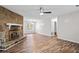 Bright living room with stone fireplace and wood floors creating a warm atmosphere at 3645 Fay Dr, Rex, GA 30273