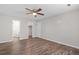 Main bedroom features neutral walls, natural light, and vinyl wood-look flooring at 3645 Fay Dr, Rex, GA 30273