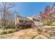 Charming two-story home featuring a front porch, blue shutters, and a two-car garage at 45 Somerset Ct, Covington, GA 30016