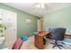 Home office with green walls and carpet at 45 Somerset Ct, Covington, GA 30016