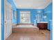 Bright bathroom with a large soaking tub and tile flooring at 1312 Brandl Sw Dr, Marietta, GA 30008
