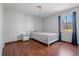 Cozy bedroom with hardwood floors and a natural light at 1312 Brandl Sw Dr, Marietta, GA 30008