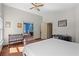 Large bedroom featuring wood floors, natural light and an adjacent en-suite bathroom at 1312 Brandl Sw Dr, Marietta, GA 30008