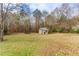 Spacious backyard with a storage shed and plenty of room for outdoor activities at 775 Freeman Dr, Covington, GA 30016