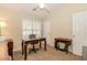 Bedroom or office with neutral decor and a large window at 775 Freeman Dr, Covington, GA 30016
