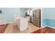 Modern kitchen with stainless steel appliances and adjacent eat in breakfast area at 775 Freeman Dr, Covington, GA 30016