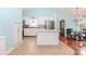 Kitchen featuring a stainless-steel refrigerator, eat in breakfast area, and stylish pendant lighting at 775 Freeman Dr, Covington, GA 30016