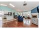 Open-concept living space featuring hardwood floors, fireplace, and a seamless flow at 775 Freeman Dr, Covington, GA 30016