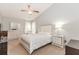 Spacious main bedroom with vaulted ceilings, carpet, and neutral decor at 775 Freeman Dr, Covington, GA 30016