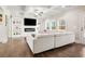 Cozy living room with a modern fireplace, built-in shelving, and comfortable seating for relaxation at 844 Pool Rd, Hiram, GA 30141