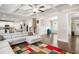 Open-concept living space with a coffered ceiling, seamless flow to the dining area, and abundant natural light at 844 Pool Rd, Hiram, GA 30141