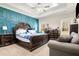 Spacious main bedroom with tray ceiling, accent wall, and a relaxing sitting area at 844 Pool Rd, Hiram, GA 30141