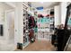 Organized walk-in closet with ample shelving, storage, and racks for clothing at 844 Pool Rd, Hiram, GA 30141