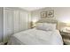 Bedroom with plush bedding, neutral decor, and ample closet space for organized living at 2901 Lenox Rd # 1002, Atlanta, GA 30324